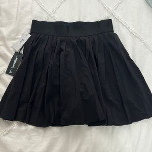 Aritzia Tennis Skirt (Tna Action) in Black